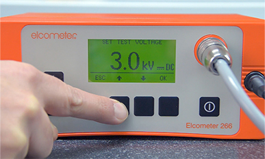 Selecting test voltage ELCOMETER HOLIDAY TESTING